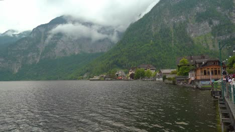 Hallstatt---Upper-Austrian-town,-inhabited-by-less-than-800-people,-is-nestled-on-the-shores-of-a-lake