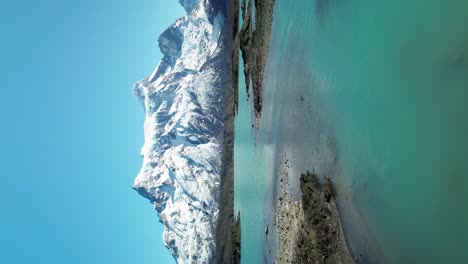 Turquoise-blue-water-of-the-Paine-River-in-Patagonia,-Chile,-Vertical-Aerial