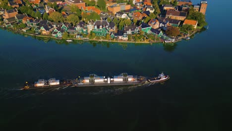 Boat-carrying-fuel-tanks-in-Zaanse-Schans---Boats-in-river-Zaan