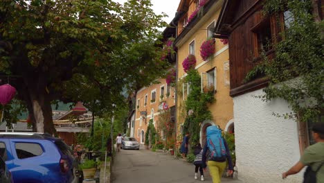 Tourists-Taking-Pictures-near-Beautiful-House-in-Hallstatt