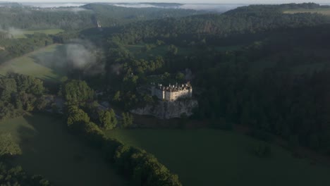 Tilt-up-view-of-Walzin-castle-medieval-castle-at-belgium,-aerial