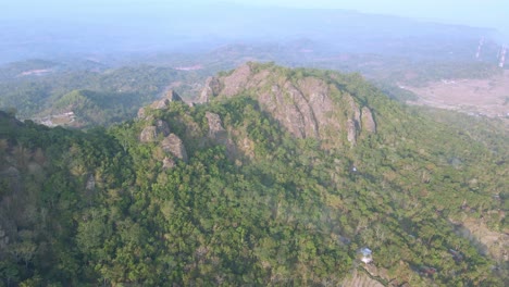 Aerial-view-of-rock-mountain-with-rock-spikes-on-the-summit