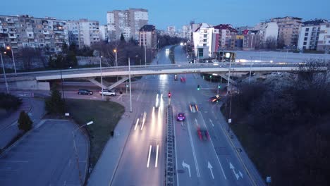 Drone-hyperlapse-over-'Andrey-Lyapchev'-Boulevard-in-Sofia,-Bulgaria-at-night