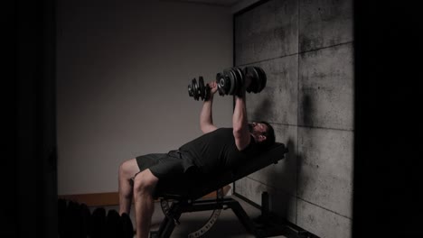Incline-dumbbell-chest-fly,-cinematic-lighting,-white-man-dressed-in-black-gym-attire
