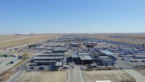 Aerial-Drone-Pan-of-rental-Car-locations-at-Denver-International-Airport