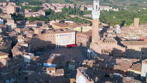 Beautiful-Piazza-del-Campo-aerial-top-view-flight-medieval-town-Siena-Tuscany-Italy