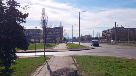 Walk-on-the-sidewalk-next-to-'Hristo-Botev'-Boulevard-in-Sofia,-Bulgaria