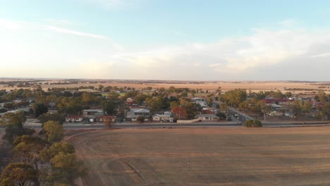 Wide-view-of-Carnamah-town-at-western-Australia-during-sunset,-aerial