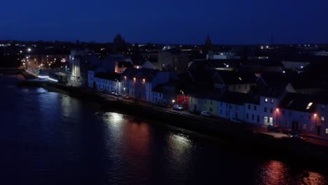 Cinematic-aerial-of-the-Long-Walk-and-River-Corrib-at-night