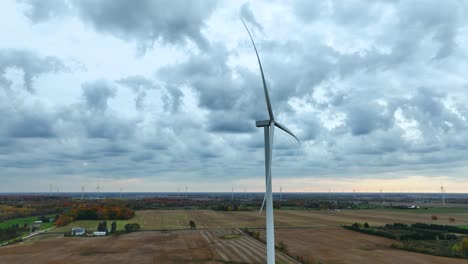 Large-wind-turbines-in-motion,-generating-renewable-energy