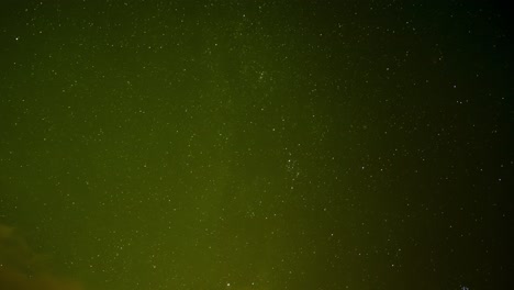 Beautiful-Aurora-Borealis-shining-in-a-starry-night-sky-with-falling-meteoroids