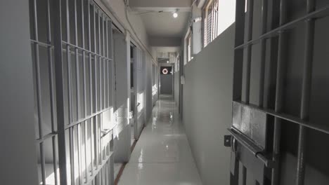 Hallway-full-of-empty-Prison-jail-cells