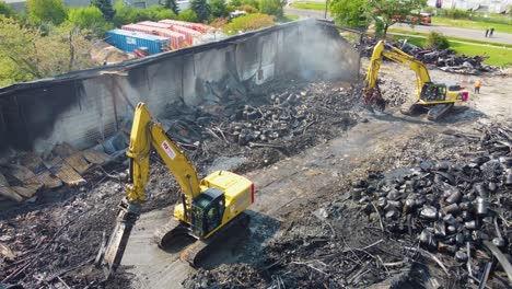 Tractors-removing-debris-after-huge-fire-in-highly-flammable-industry