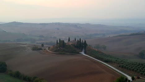 Majestic-aerial-top-view-flight-House-morning-atmosphere-rural-idyllic-environment-Tuscany-Italy