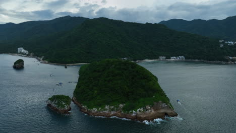 Aerial-view-over-the-Mismaloya-arches,-on-the-coast-of-Puerto-Vallarta,-Mexico