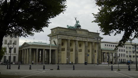 POV-shot-walking-toward-the-Brandenburg-Gate,-cloudy-day-in-Berlin
