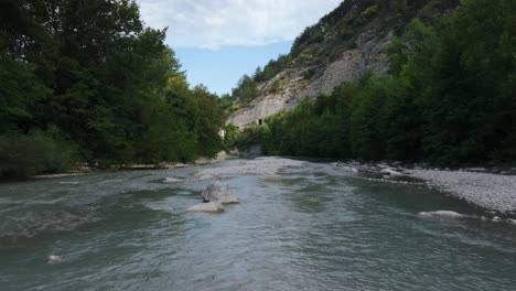 Natural-low-angle-sunlight-scenery-of-river,-overlooking-the-Col-de-Blancheville,-river-Drôme