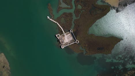 Ancient-Castle-Sinking-in-a-Shallow-Lagoon-Tide-in-Albania---A-Visual-Metaphor-for-the-Impact-of-Global-Warming,-Eerie-Consequences