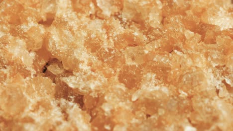 Super-macro-close-up-partially-refined-soft-sugar-consisting-of-sugar-crystals-with-some-residual-molasses-content-(natural-brown-sugar).