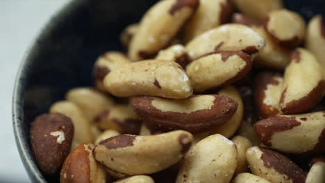 Brazil-nuts-rotating-in-blue-bowl