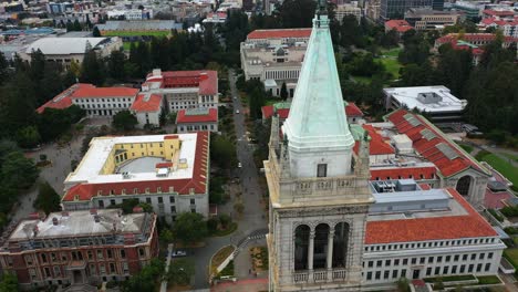 Aerial-tilt-shot-rising-in-front-of-the-Campanile,-Sather-Tower-in-Berkeley,-USA