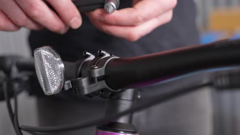 Ensuring-road-safety-for-bicycle---static-closeup-view-of-reflector-on-handlebar