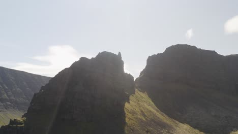 Looking-up-at-the-peak-of-Svalvogar-mountain-in-Iceland-on-a-bluebird-sunny-day-in-summer-on-the-European-island