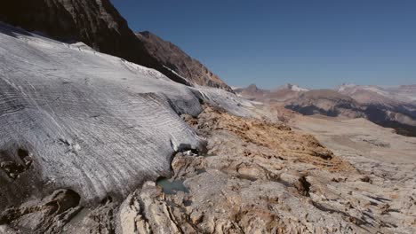 Glacier-in-mountains-range-aerial