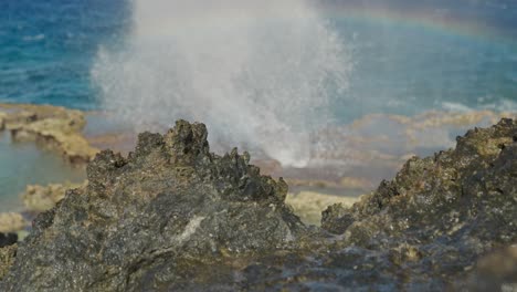 Small-rainbow-showing-at-blow-hole-in-Tinian-Island