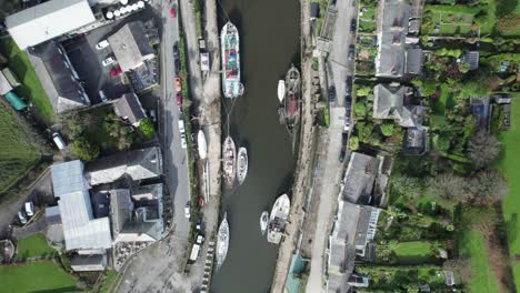 Top-down-view-of-historic-Charlestown-harbour,-with-old-boats