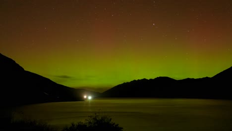 A-beautiful-aurora-timelapse-created-on-a-calm-night-and-nestled-within-the-stunning-mountain-backdrop-of-Queenstown-New-Zealand