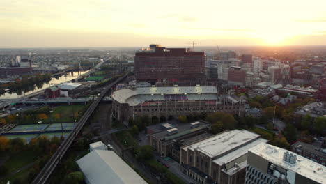 Aerial-view-toward-the-Hospital-of-the-University-of-Pennsylvania,-sunset-in-Philadelphia