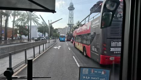 Driver-Pov-of-City-tour-around-the-city-of-Barcelona-by-bus,-Spain