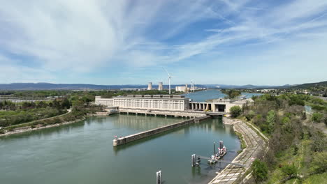 Aerial-panorama:-Donzère-Mondragon-Dam,-a-storied-green-energy-landmark.