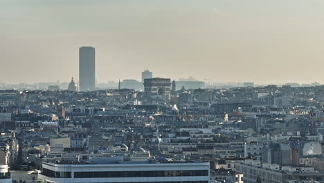Above-Paris:-Landmarks-emerge-through-pollution,-narrating-the-city's-storied