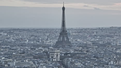 From-the-air,-Paris'-economic-vitality-shines,-despite-the-smoggy-backdrop.