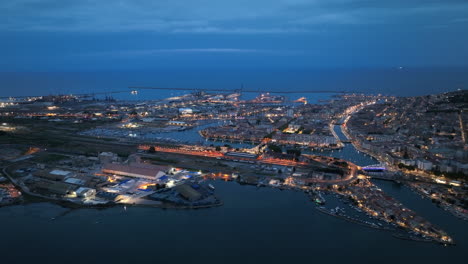 Bird's-eye-at-night:-Sète's-twinkling-lights,-artistic-soul,-and-maritime-legacy