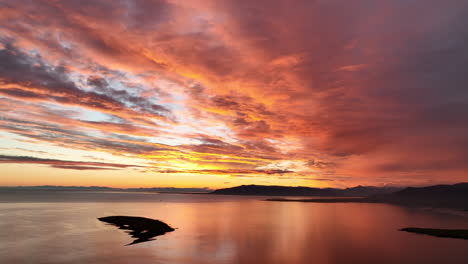 Calm-flat-sea-with-beautiful-sunset-in-Iceland-Reykjavik