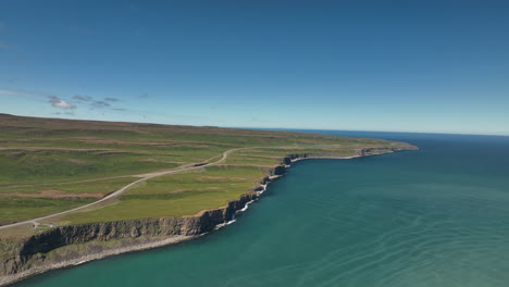North-of-Iceland-cliffs-seaside-coast-road-sunny-day