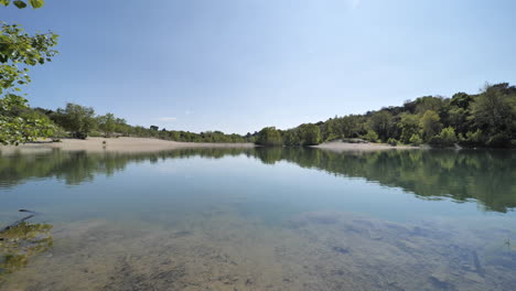 Pont-du-diable-beach-south-of-France-calm-water-reflection-of-trees-France