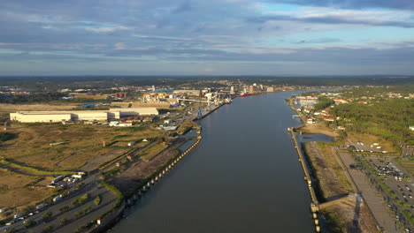 Industrial-area-along-the-Adour-river-Bayonne-district-France-aerial-sunset