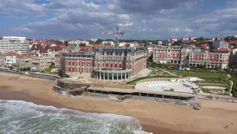 hotel-du-Palais-beside-the-Atlantic-beach-in-the-resort-town-of-Biarritz-aerial