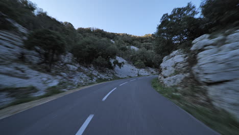 Driving-on-a-road-passing-into-the-mountains-gorges-de-l'Herault-France