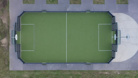 aerial-top-shot-over-a-green-basketball-court-in-Anglet-France-Northern-Basque