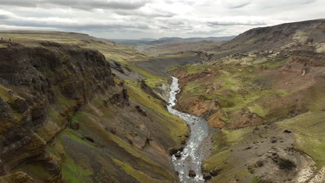 Winding-river-stream-in-the-mountains-highlands-Iceland-aerial-shot