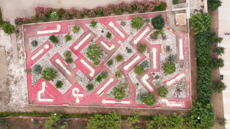 Aerial-top-shot-of-a-mii-gold-court-in-a-garden