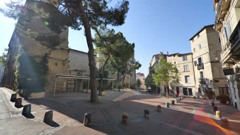 Empty-square-with-a-tree-in-Montpellier-sunny-day-Lockdown-period-France