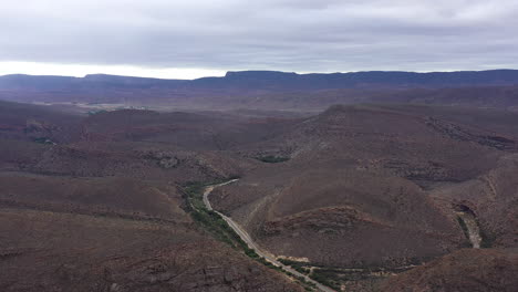 Road-to-nowhere-in-South-Africa-aerial-shot-arid-environment