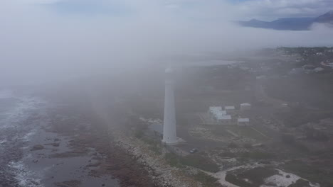 Aerial-shot-around-Hangklip-Lighthouse-South-Africa-foggy-morning