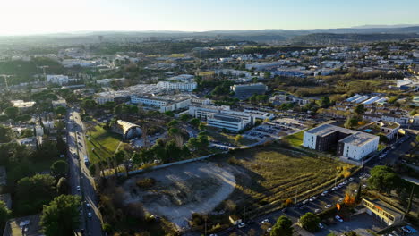 Sunlit-Montpellier-captured-from-the-sky,-revealing-its-urban-design-and-natural